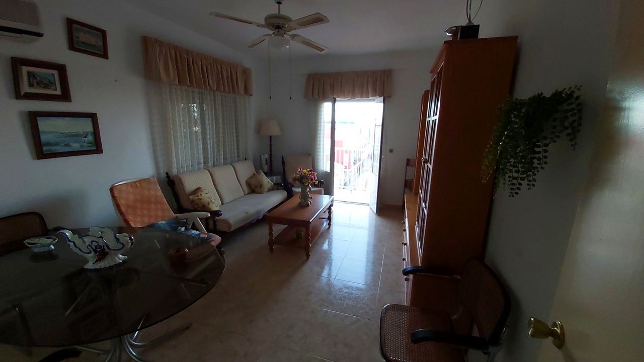 Second-floor apartment with terrace and utility room